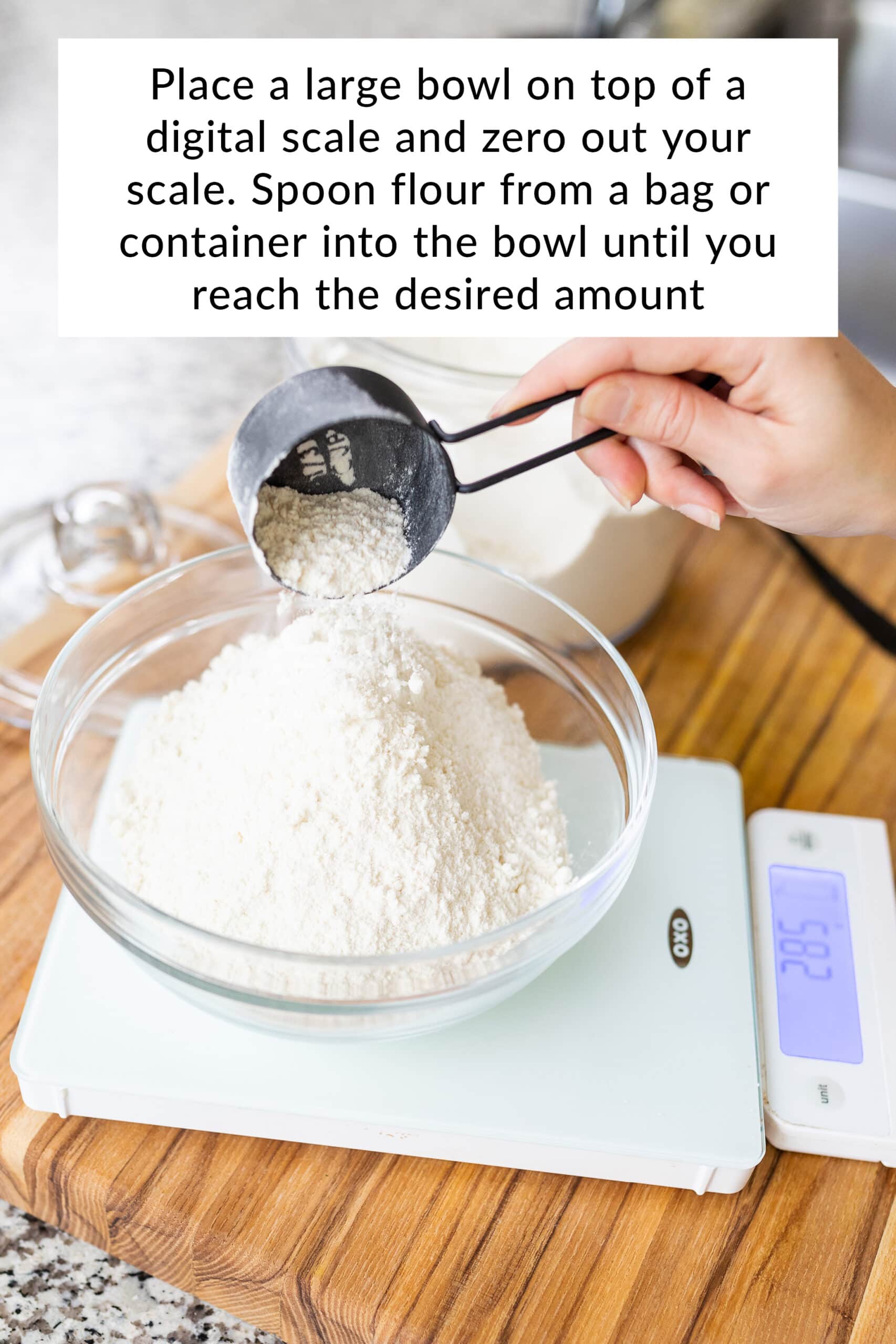 measuring the flour by weighing with a scale.